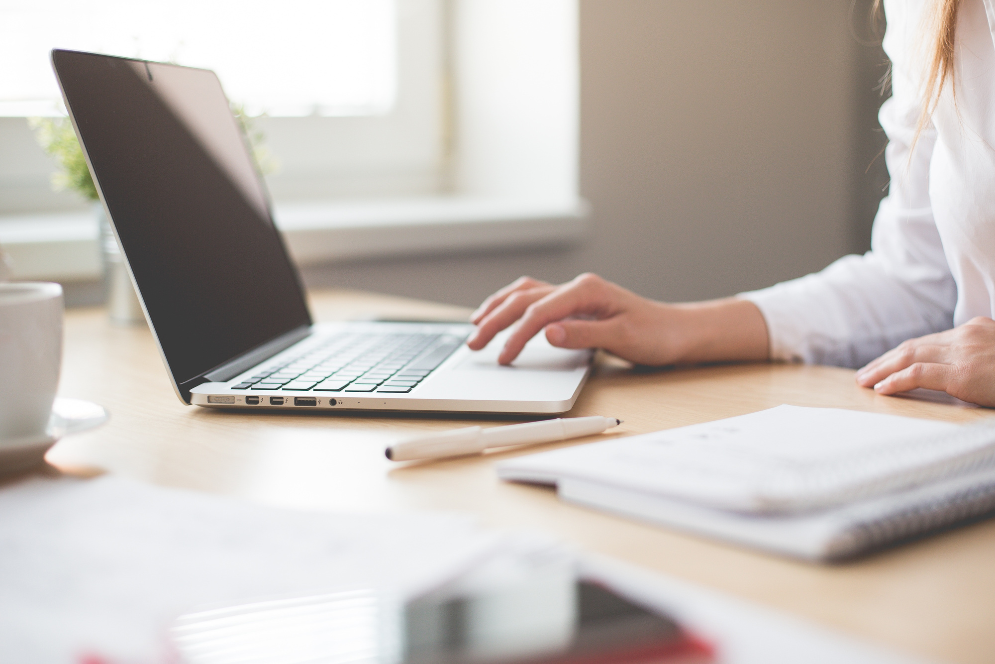 Woman Working on a Laptop